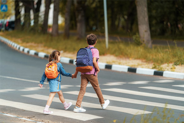 kid pedestrians at crosswalk in spokane valley